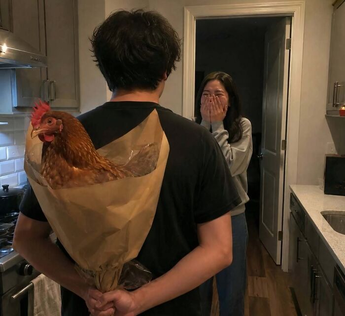 A hilarious pic of a man hiding a chicken bouquet behind his back for a laughing woman.