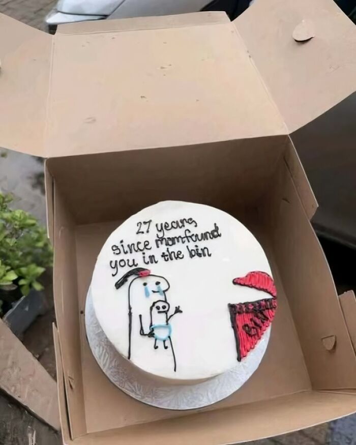 Funny pics of a custom cake with a hilarious text joke inside an open box.
