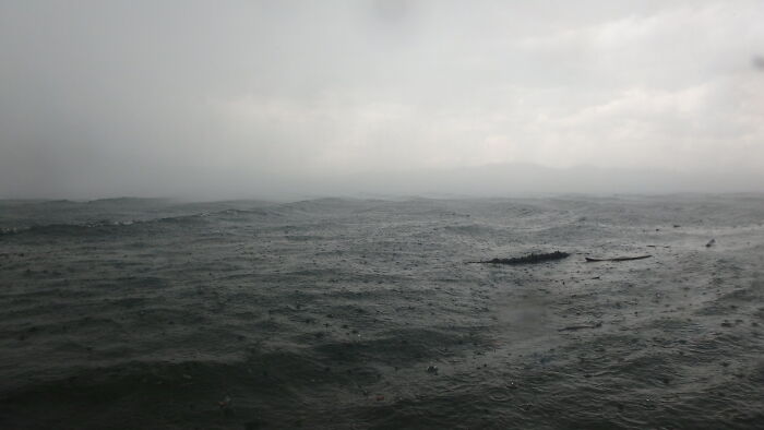 Stormy deep-water sea under gray cloudy sky