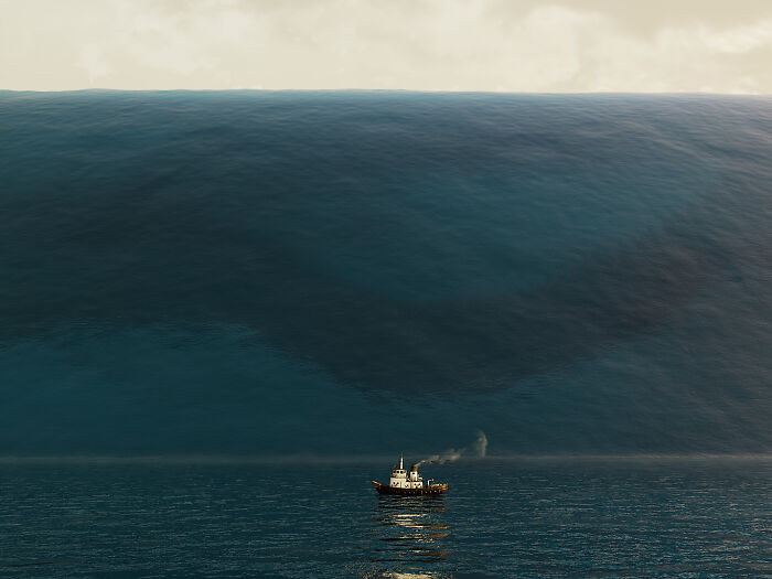 Small boat sailing on ocean with huge dark deep-water wave behind