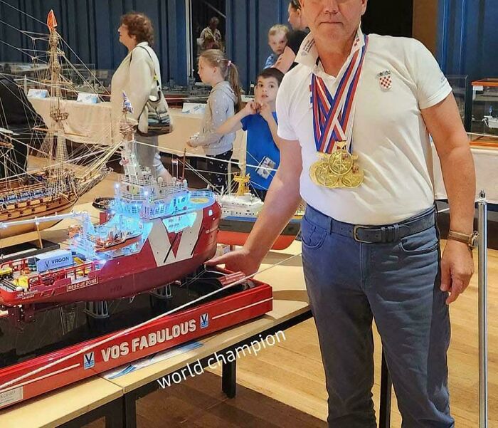 World champion with detailed model ship exhibiting phenomenal miniature craftsmanship