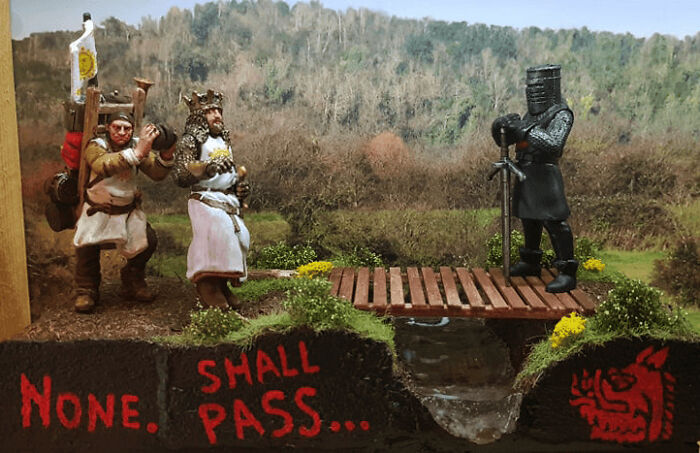 Intricately designed miniature medieval knights diorama with detailed scenery