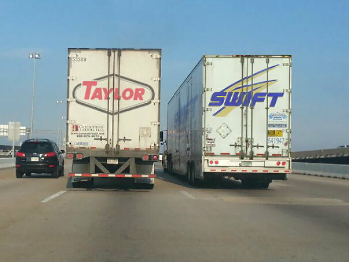 Two trucks side by side on highway with logos creating a visual glitch effect