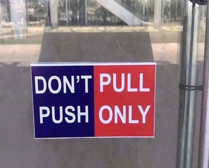 A sign on a door with confusing labels reading Don't Pull and Push Only.