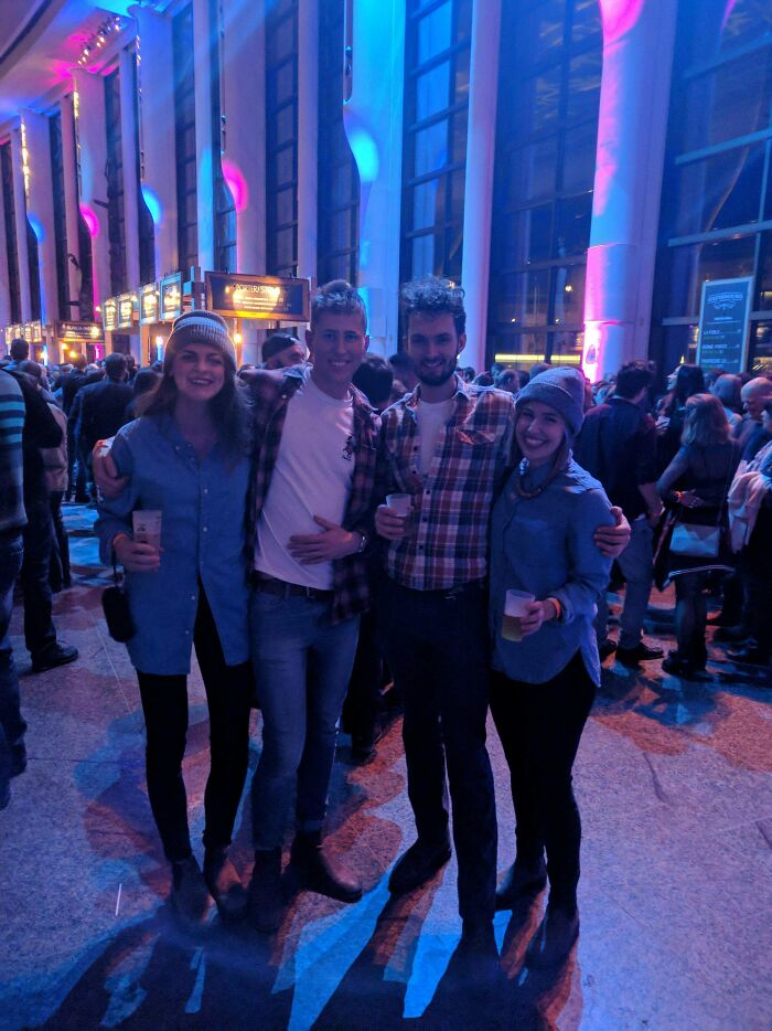 Group of friends at night event with glitch matrix lighting