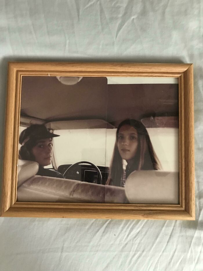 Old photo of two women in car fragmented into halves glitch