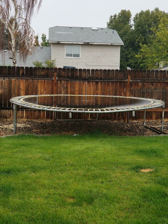 Trampoline hovering above ground in backyard glitch in the matrix
