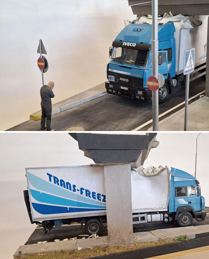 Realistic miniature truck crashed under bridge with detailed road signs