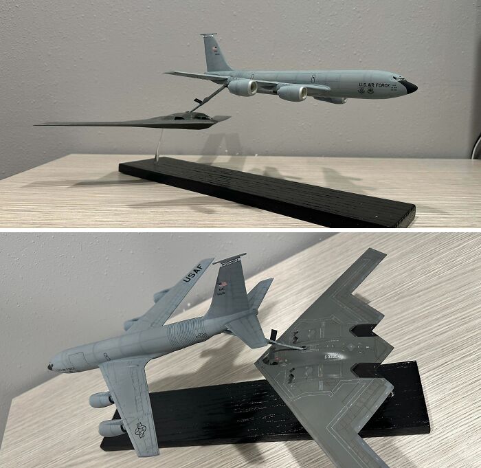 Detailed miniature military aircraft models showcasing USAF planes on a display stand