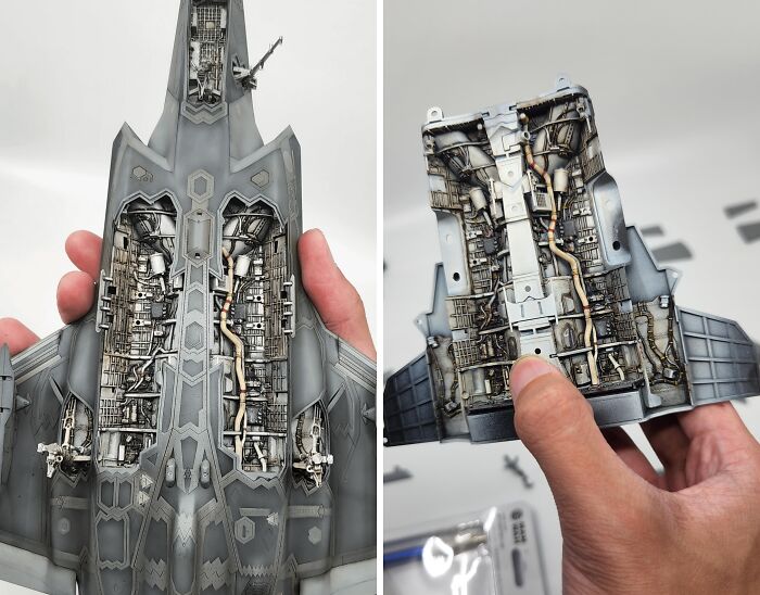 Detailed craftsmanship of miniature airplane model with visible mechanical interiors