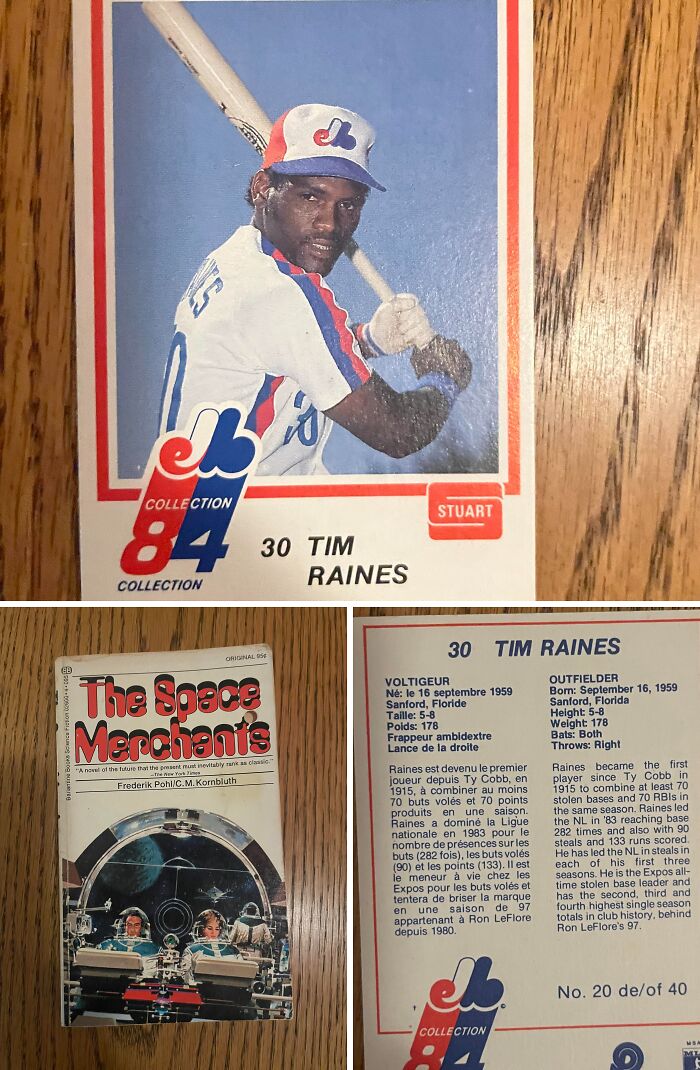 Found paper baseball card and vintage sci-fi book placed on a wooden surface