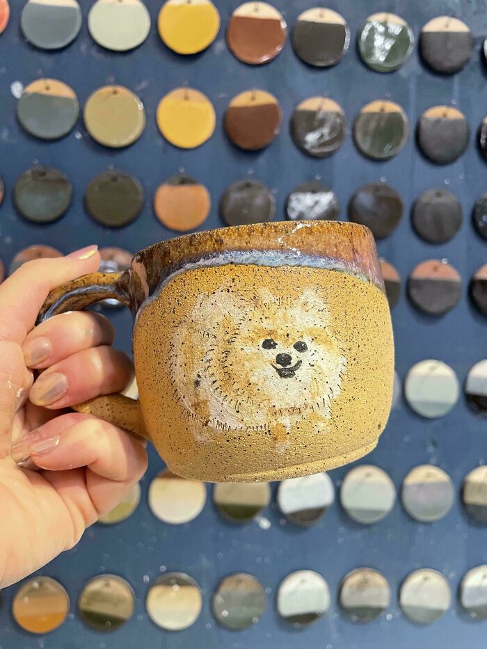 Handcrafted ceramic mug with a cute dog painting