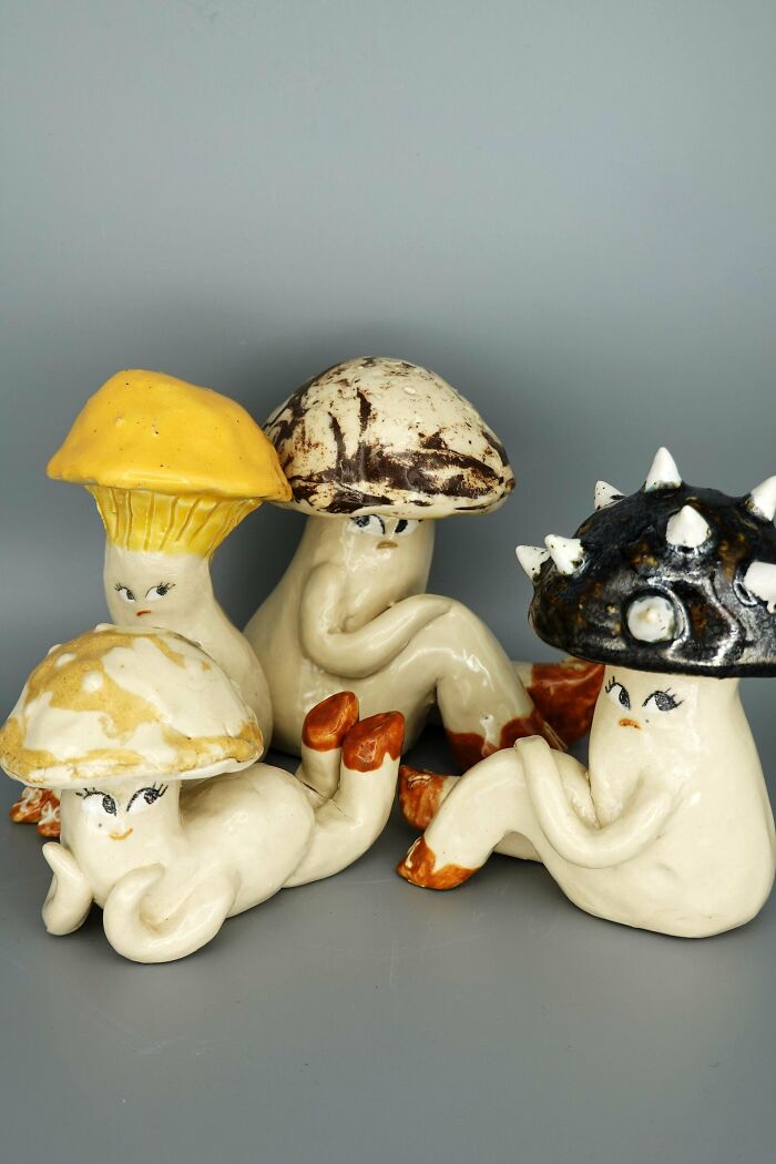 Whimsical ceramic mushroom figures showcasing creative pottery creations