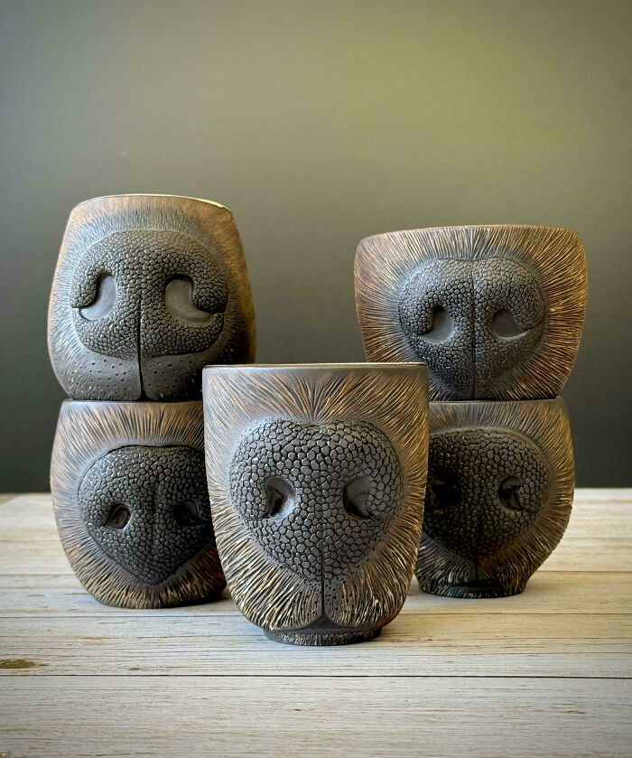 Set of ceramic cups shaped like animal snouts showing beautiful pottery creations