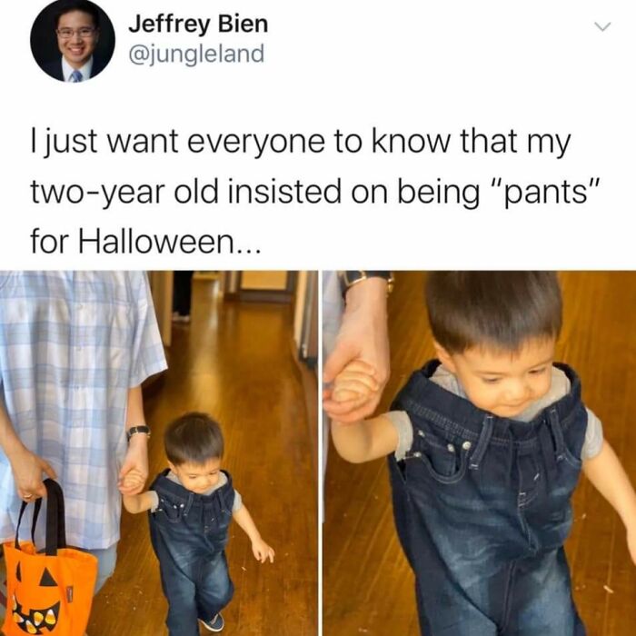 A toddler wearing blue jeans pulled all the way up to his neck as creative kids Halloween costumes.