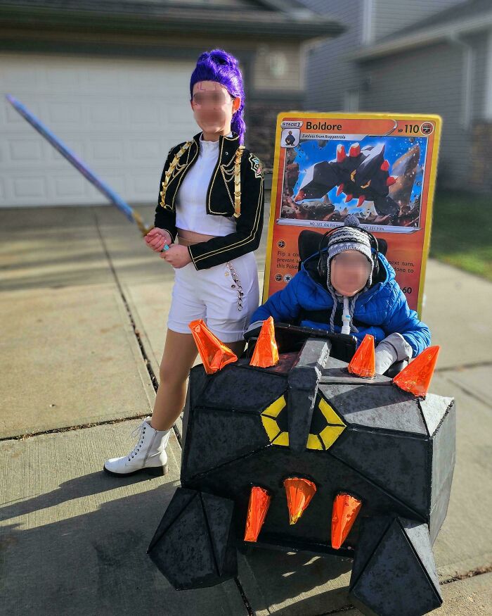 A child in a wheelchair integrated into a Pokemon card character set of kids Halloween costumes.