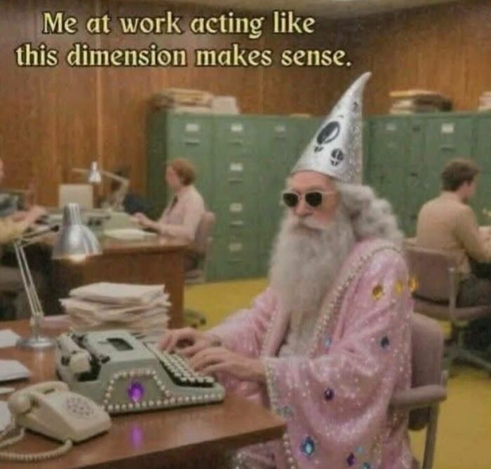 Wizard typing on a typewriter in an office setting, representing a funny and relatable meme.