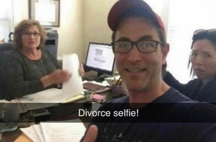 A man taking a cheerful selfie in a lawyer office with the text Divorce selfie, funny memes