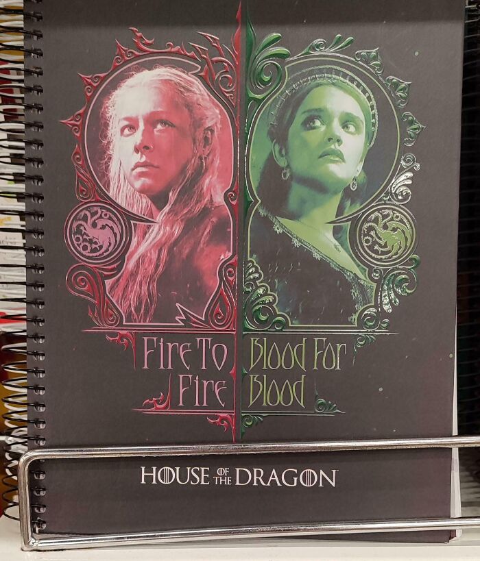 A poorly designed notebook sign with confusing text layout reading Fire To Blood For Fire Blood.