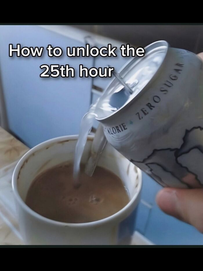 Hand pouring energy drink into a mug of coffee, reflecting hilarious memes about daily struggles.