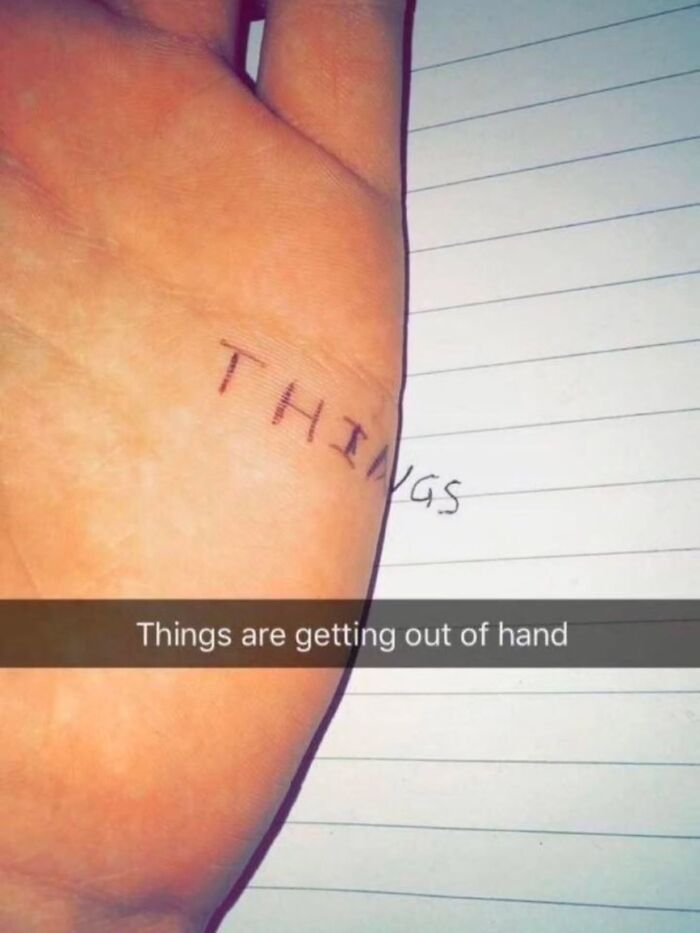 A hand with the word THINGS written across the palm and paper in a literal hilarious real life meme.