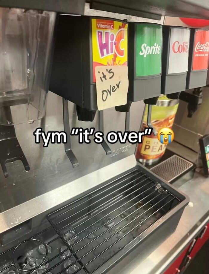 A hilarious real life meme of a soda fountain machine with an it is over note attached to it