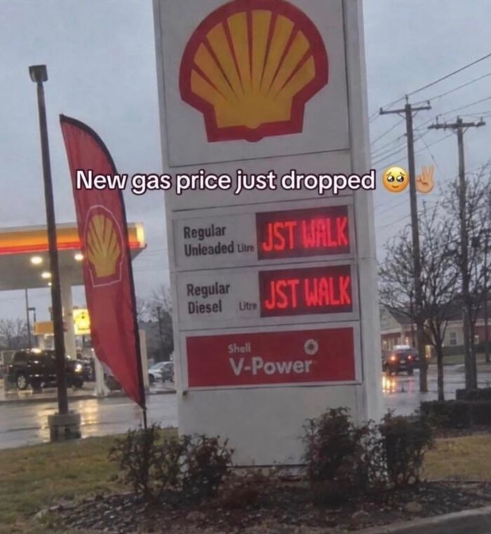 Gas station price sign displaying JST WALK in hilarious memes from real life.