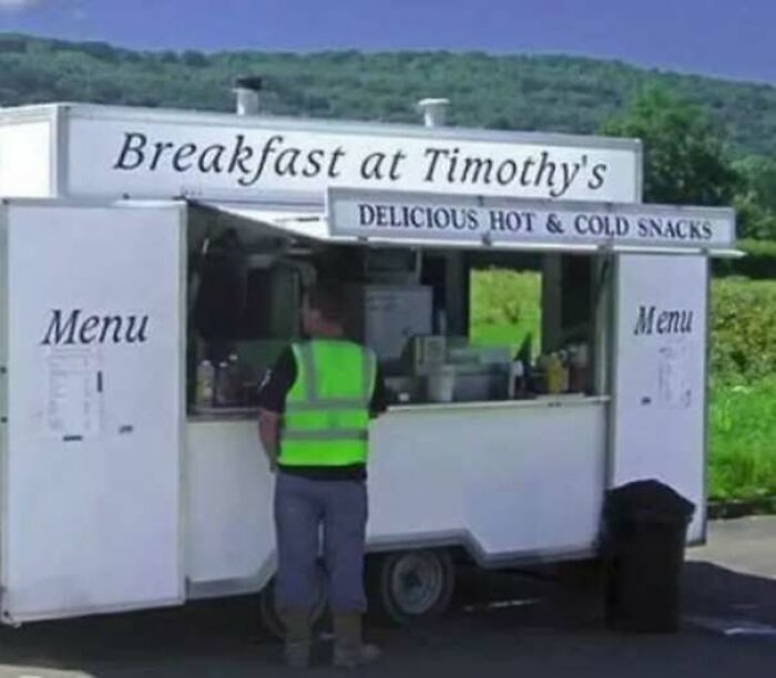 A food truck display showcasing funny ads and signs with humor