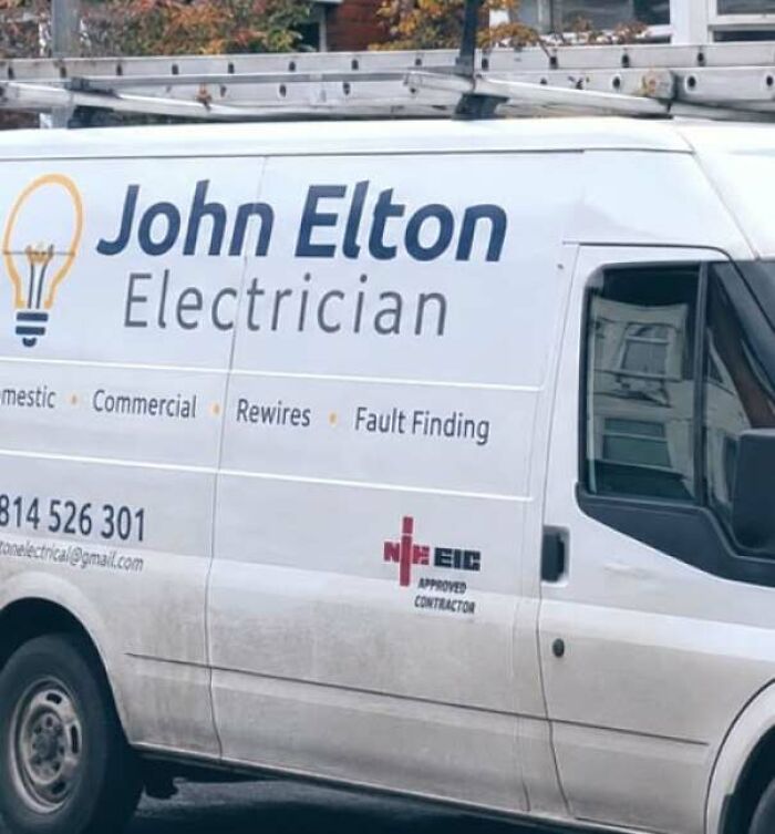 A white van labeled John Elton Electrician, a hilarious ad that clearly missed the mark with its unintended name pun.