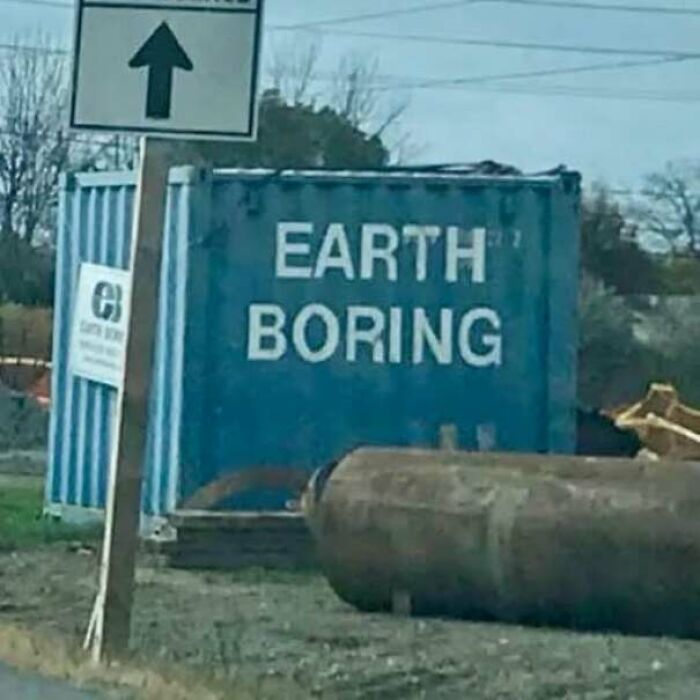 Blue shipping container labelled Earth Boring, serving as one of the hilarious signs that missed the mark.