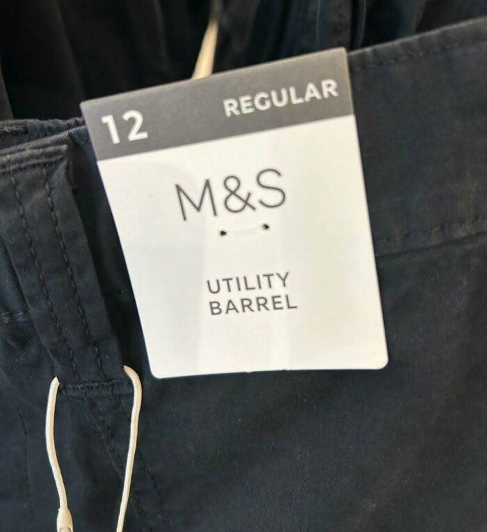 Hilarious ads: a clothing tag for M&S pants with a funny misprint labeling the fit as Utility Barrel.