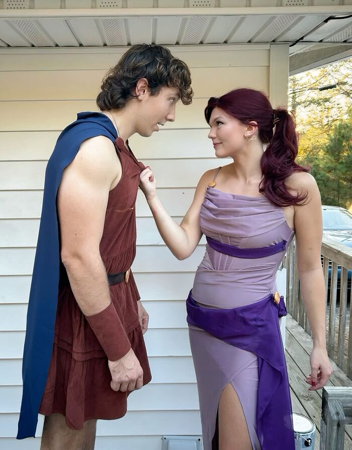 Hercules and Megara looking at each other in cool Halloween couples costumes.