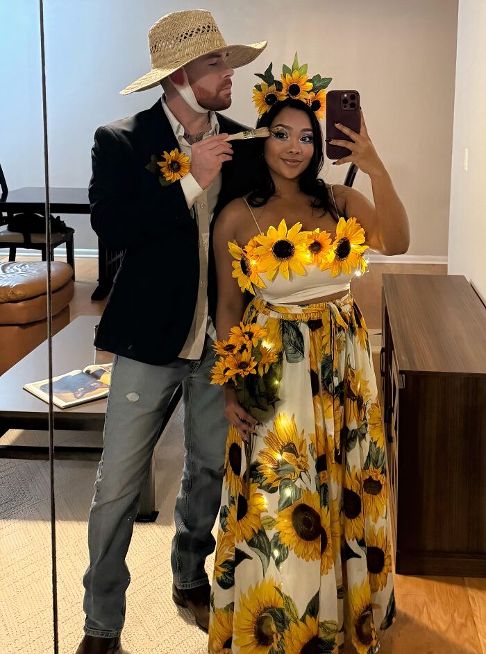 A couple dressed in Van Gogh and sunflower outfit for funny cool Halloween couples costumes.