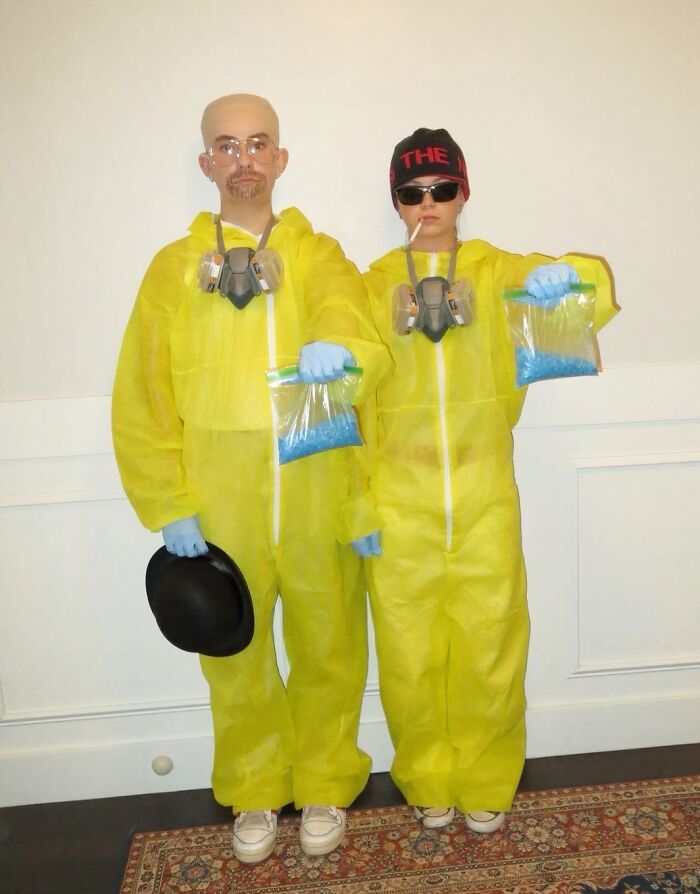 Breaking Bad themed funny Halloween couples costumes featuring yellow hazmat suits and blue candy.
