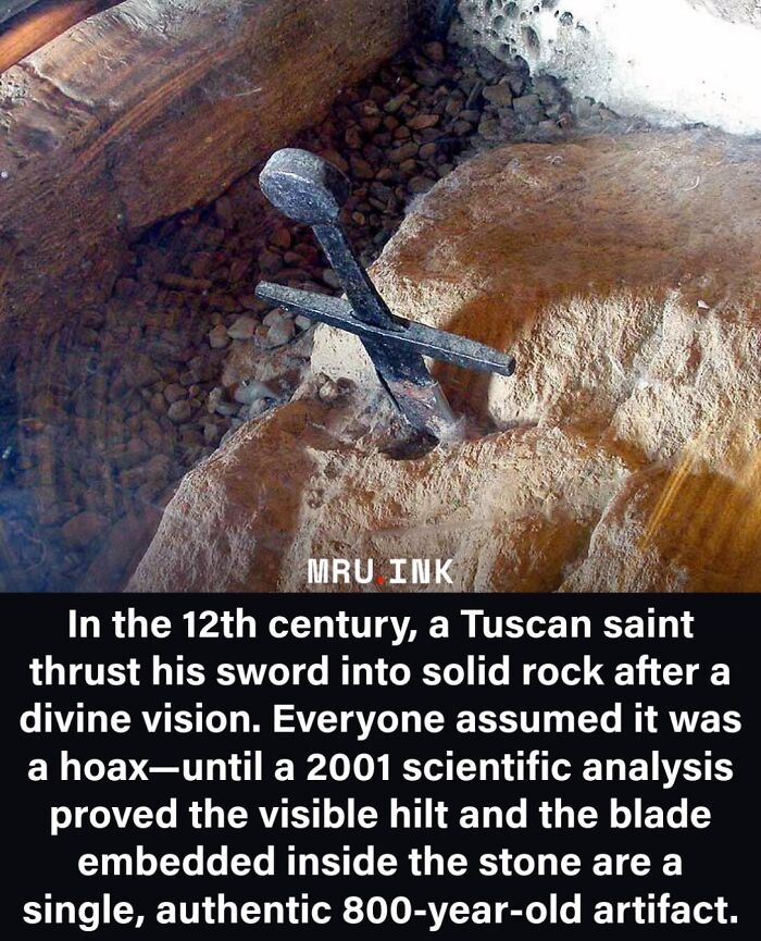 An ancient sword embedded in rock, showcasing fascinating photos and facts from history