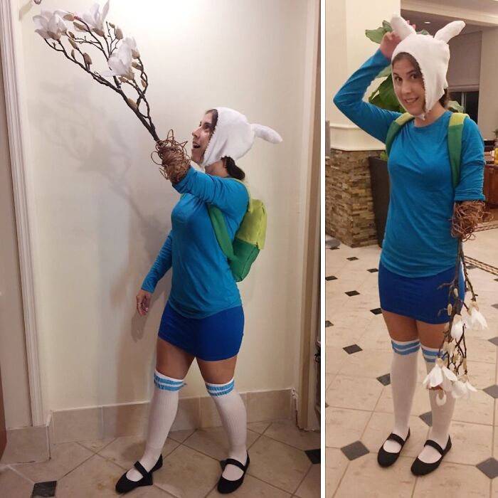 A woman with one arm incorporated into her Finn costume for a creative Halloween look.