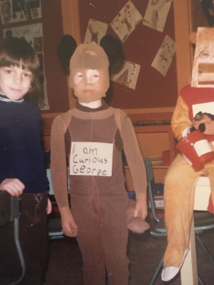 Child wearing a creepy homemade Curious George Halloween costume.