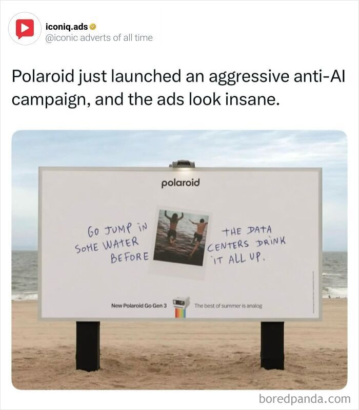 A Polaroid billboard campaign featured in iconic ads highlighting anti-AI messaging on a beach.