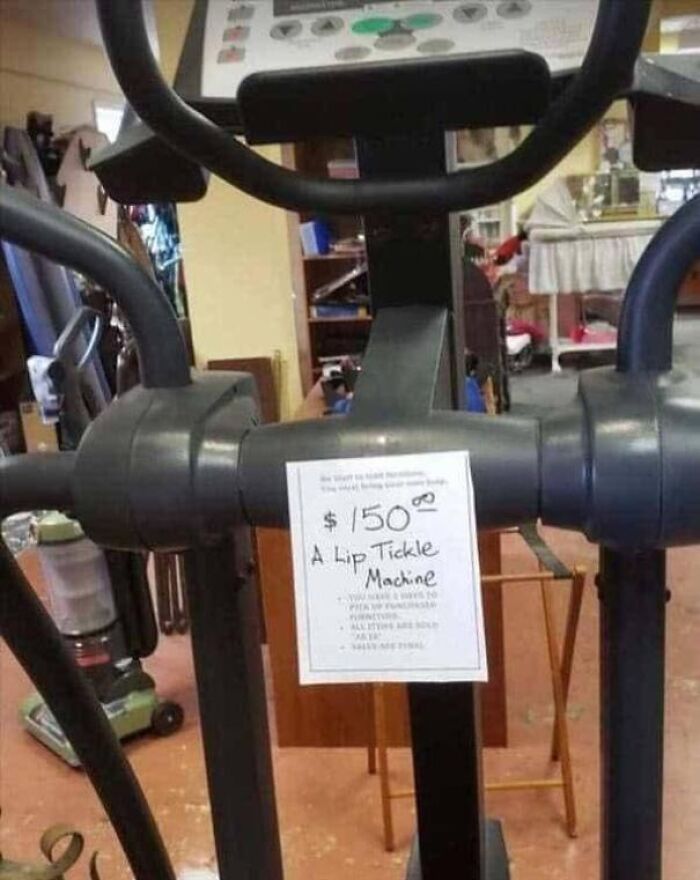 Elliptical machine labeled as lip tickle machine in a funny example of spelling fails.