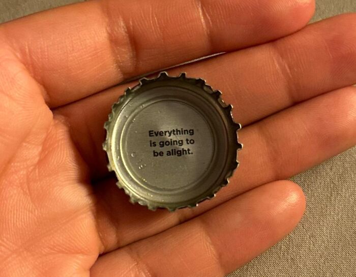 A bottle cap with spelling fails printing Everything is going to be alight