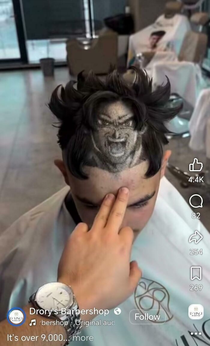 An elaborate haircut featuring an anime character face buzzcut, showcasing awful creations in hair art.