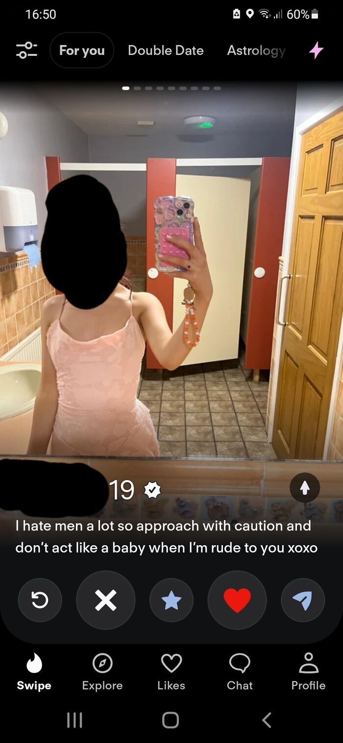 Dating app profile of a woman warning men in her bio, highlighting amusing Tinder stories.
