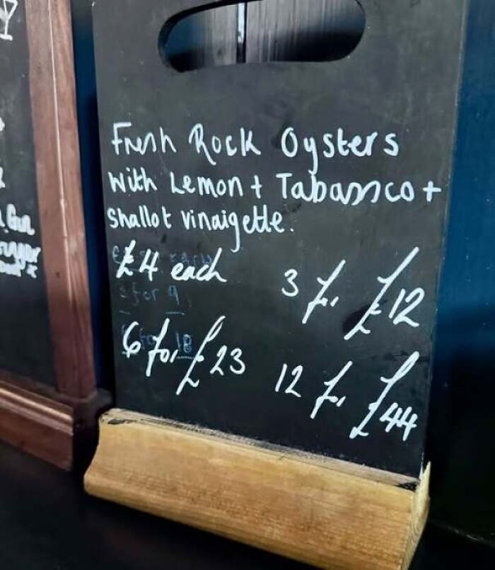 Chalkboard menu displaying prices that make no sense, showing how people are confidently wrong with simple math.