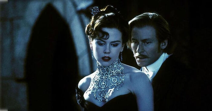Nicole Kidman wearing a stunning diamond necklace, a beautiful example of detailed movie props.