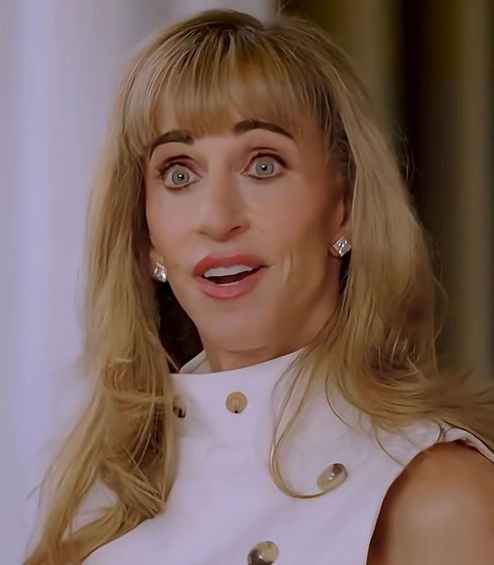 Close-up portrait of Susan Dell, wife of Dell CEO Michael Dell, with a surprised expression.