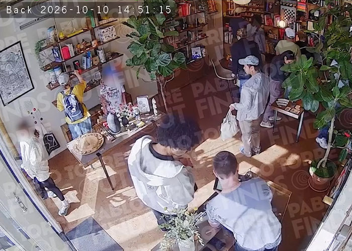 Store interior security footage showing customers shopping and browsing items
