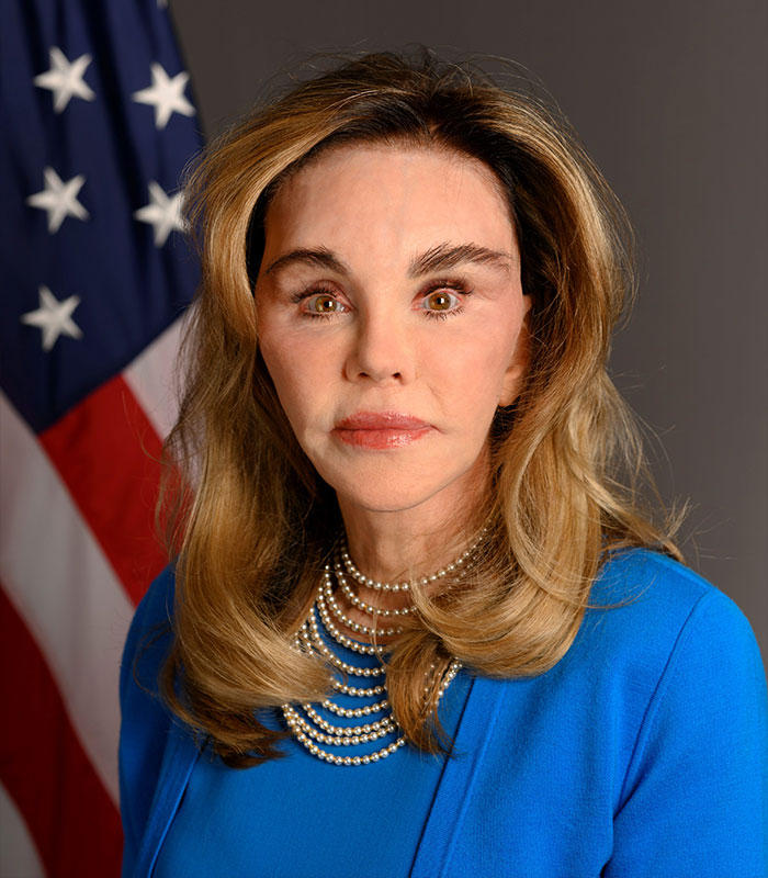Susan Dell posing in a blue outfit as part of discussions on MAGA face transformation trends. Susan Dell posing in a blue outfit as part of discussions on MAGA face transformation trends.