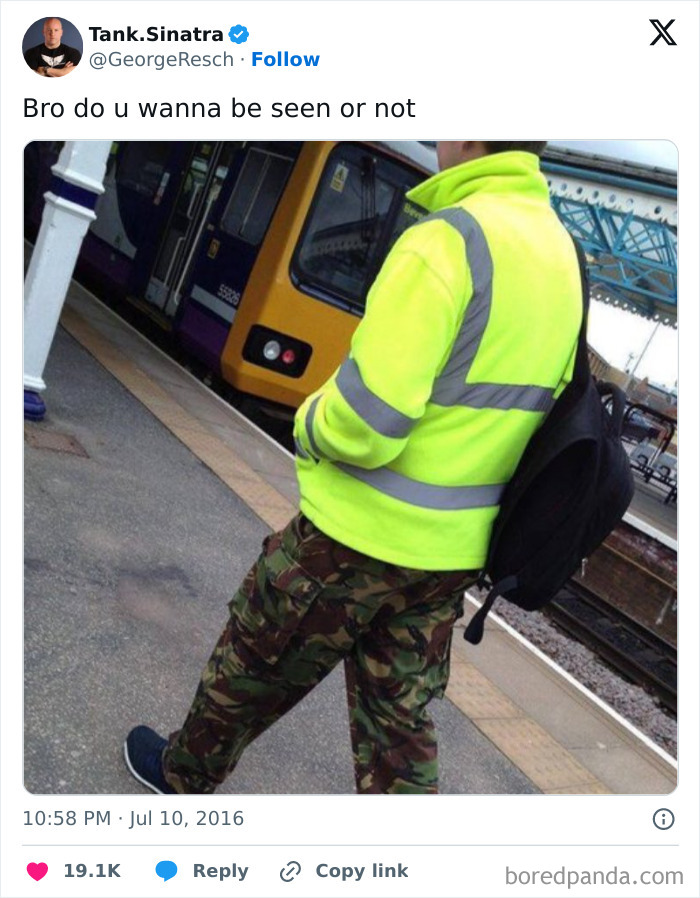 Funny tweet featuring a person in camo pants and bright yellow jacket at train station