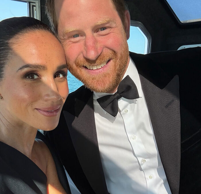 Meghan Markle and Prince Harry smiling together close-up in formal attire Meghan Markle and Prince Harry smiling together close-up in formal attire