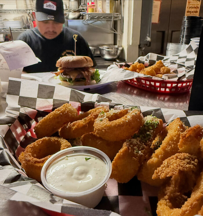 Fried food and a burger served at a California bar establishment.